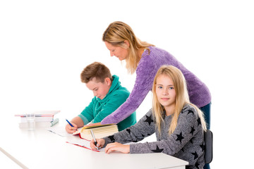 girl and boy with teache together in the classroom