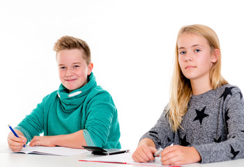 girl and boy together in the classroom