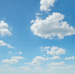 Naklejka na ściany i meble light cumulus clouds in the blue sky