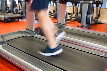 Man running on a treadmill