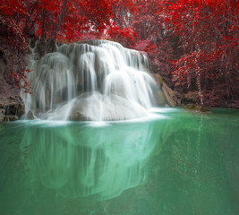 Deep forest waterfall in autumn scene at Huay Mae Kamin waterfall, Kanchanaburi, Thailand
