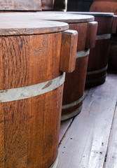 Obraz premium Stack of wooden tub with cover