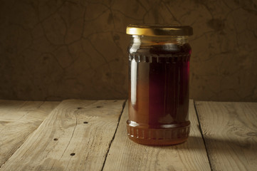Still life of jars of honey, propolis and pollen