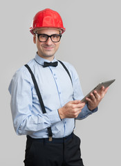 Handsome engineer with digital tablet