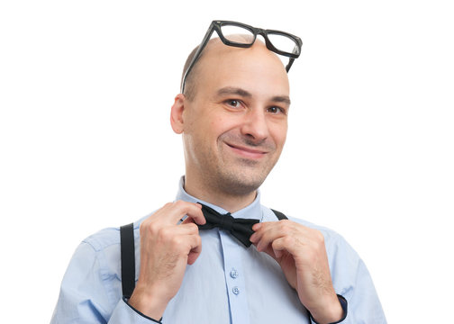 Confident Handsome guy with suspenders and bow-tie