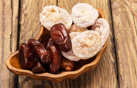 dried fruits in wooden bowl