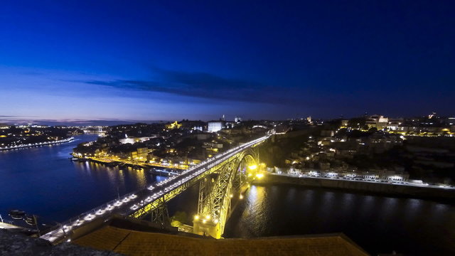 Evening view of Dom Luis Bridge over Duoro river in City of Porto, Portugal