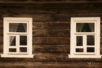 Windows in a wooden hut