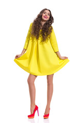Happy Fashion Model In Yellow Mini Dress