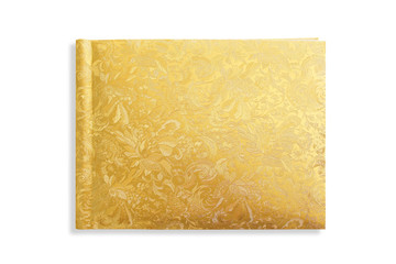 golden cover hardcover book on white