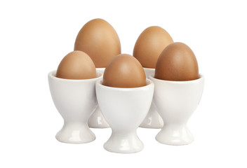 Яица разных размеров на подставке, радиальная композиция