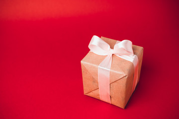 Christmas gift on ed background