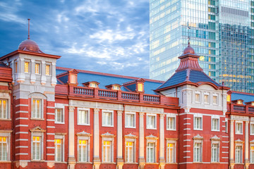 Tokyo railway station and Tokyo highrise building at twilight time..