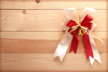 ribbon bow on wooden