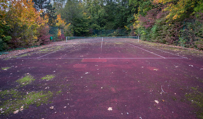 old abandoned tennis court - 94644610