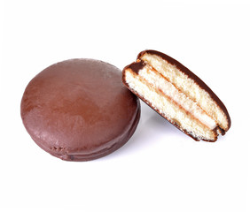 Round chocolate wafers on white background
