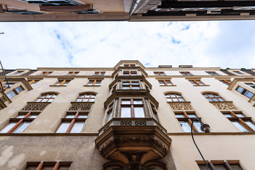 Naklejka premium apartment houses on narrow street in Vienna , Austria