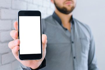 Close up of a man using mobile smart phone