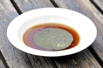 Mold growing on a plate of soup