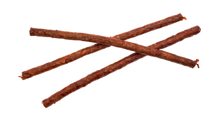 Three rolled rawhide dog chews