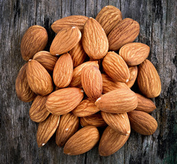 almonds on old wood background