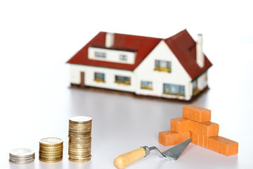 Geldmünzen und Bausymbol