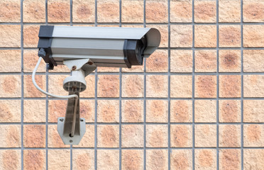 Video camera security system on the wall of the building