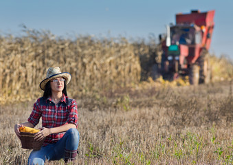 Naklejka na ściany i meble Woman in corn field