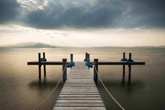 Wooden pier on the lake. Fog. Long exposure. © patma145
