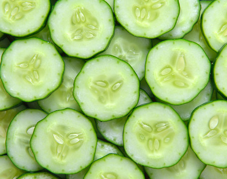 Fresh Cucumber and slices white background