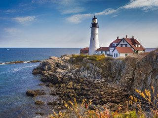 Fototapeta na wymiar Portland head lighthouse off the coast of Maine, during the fall season