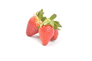 Strawberries with leaves. Isolated on a white background.