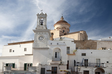 Fototapeta premium Bell tower with clock in Pisticci south Italy