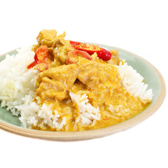 Red curry chicken and white rice on white background