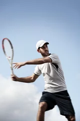 Zelfklevend Fotobehang male tennis player in action © Mikael Damkier