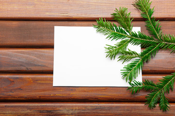 blank Christmas card on a wooden table