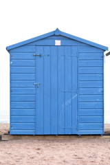 A blue wooden beach hut in Teignmouth, Devon, England