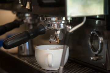 preparing coffee in cafe