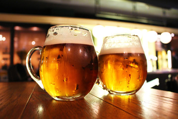 Beer glasses on a bar table
