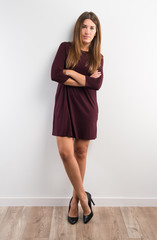 Pretty woman with her arm crossed