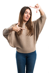 Girl focusing with her fingers