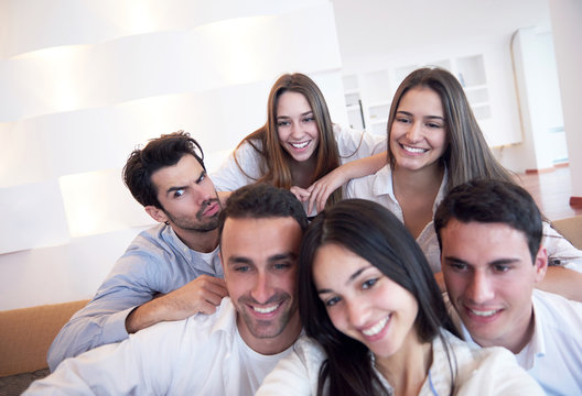 group of friends taking selfie