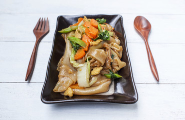 Closeup fried noodle with vegetables and egg, vegetarian style