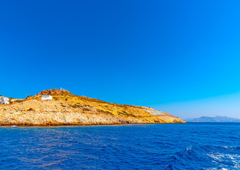 the Greek flag painted on the ground of Pserimos island in Greece