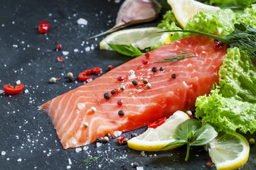 Salmon fillet with spices, herbs and seasonings, selective focus