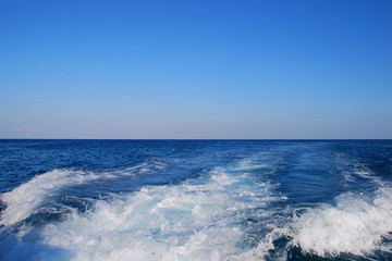 Fototapeta na wymiar Mediterranean Sea Background. Blue Water. Waves on the Surface.