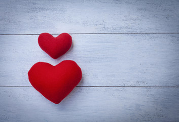 Fototapeta premium Red heart with space on wooden floor