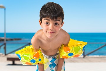 Obraz premium Happy child in swimsuit