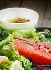 Salmon fillet with spices, herbs and seasonings, selective focus