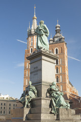 Fototapeta premium Poland, Krakow, Mickiewicz Monument, st Mary Curch Towers, Midday